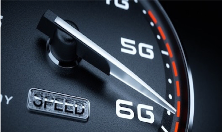 Close-up of a speedometer-style gauge pointing from 5G to 6G, symbolising the rapid evolution of digital connectivity and mobile network technology.