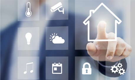 Person interacting with a transparent touchscreen displaying smart home and infrastructure icons, including lighting, security, temperature, and energy controls.