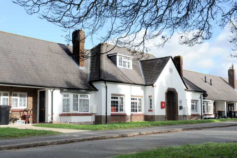 Exterior of Croft Green residential building with pitched roof and landscaped frontage.