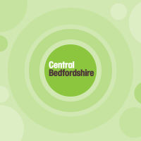 Central Bedfordshire Council logo in white and dark text inside a green circle, with pale green concentric rings background.