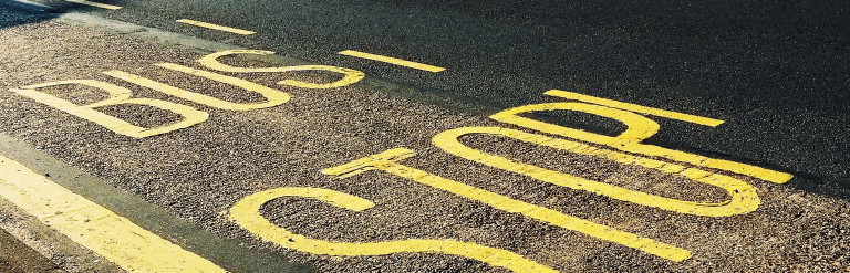 Home to school transport consultation - bus stop painted on to the road
